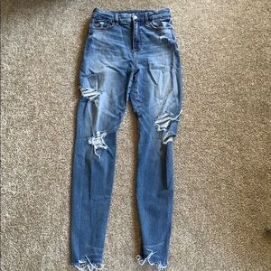 Blue ripped high waisted jeans